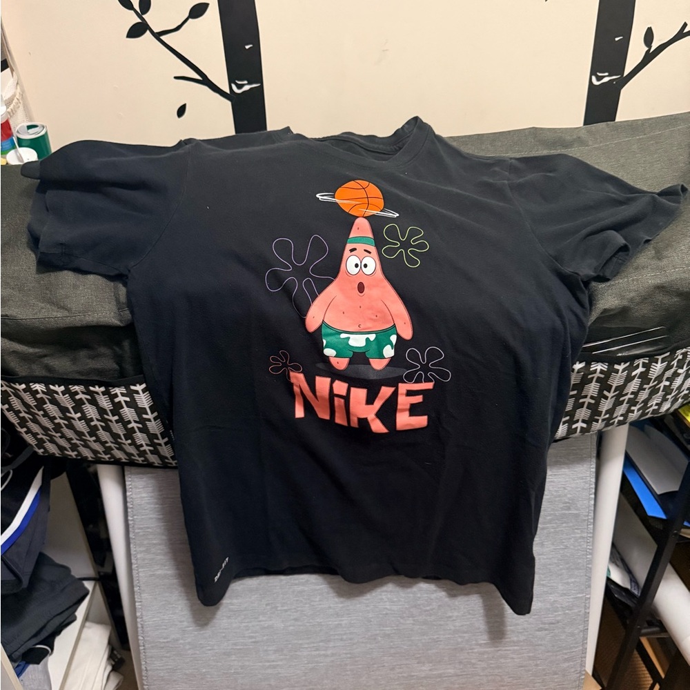 Nike Kids Black and Orange Graphic Tee